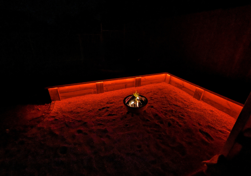 smart lighting around a fire pit